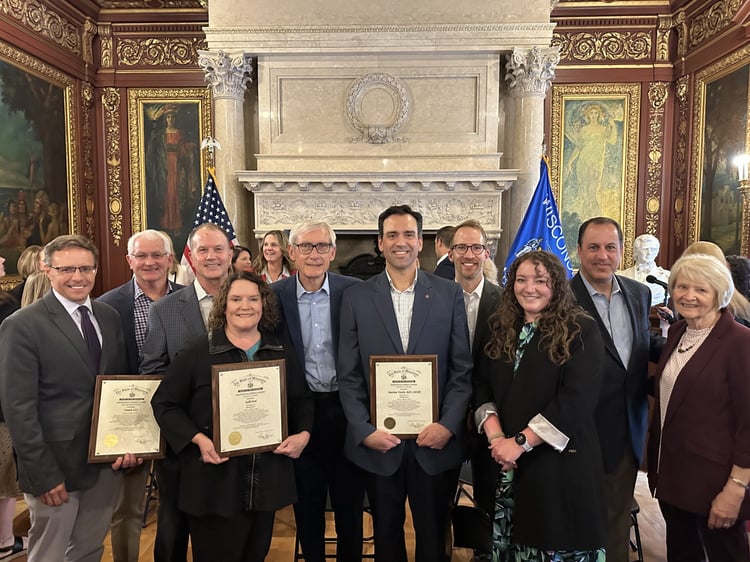 Francis, LLC with Gov. Evers Image